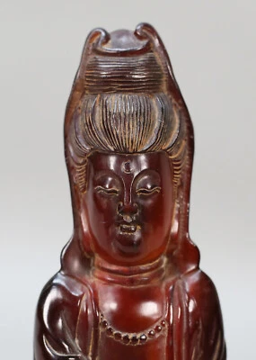Antique Dark Cherry Amber Carved Guanyin Figure - Image 1 of 4
