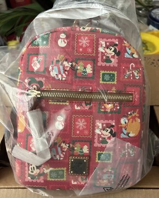 Mochila de Natal família Dooney & Bourke Mickey Minnie Pluto 2024 parques da Disney - Imagem 1 de 4