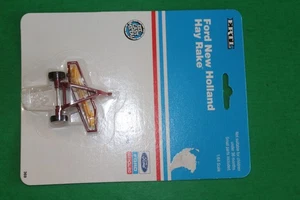 Ertl #369 Ford New Holland Hay Rake unopened package 1/64 scale - Picture 1 of 7