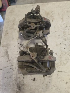 NISSAN C34 STAGEA FRONT BRAKE CALIPER PAIR - NISSAN LOGO - Picture 1 of 9