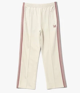 Pantalones deportivos NEEDLES beige claro con cordón cintura bolsillos con cremallera detalle de rayas laterales - Imagen 1 de 5