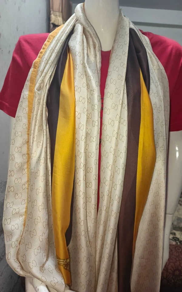 Gucci cream/beige 100% silk rectangle scarf wrap with brown and gold/yellow... - Image 1 of 4