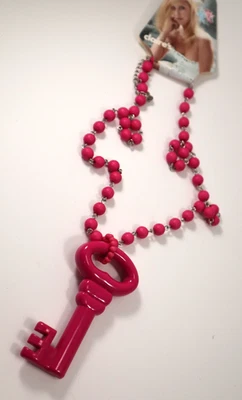 SBOT Nicky Hilton Chic hot pink plastic key bead necklace Claire's Jewelry - Image 1 of 4