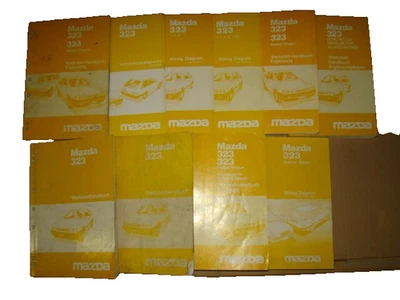 Mazda 323 Reparaturanleitung 10x Werkstattbücher Handbücher Ergänzungen 8 Kilo - Bild 1 von 3
