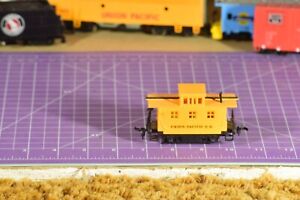 HO (Honey I Shrunk the Caboose) Union Pacific 2 axle plstc cplrs, lghtly wtd
