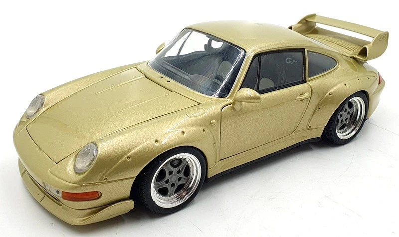 UT 1/18 Scale Diecast DC31323D - Porsche 911 GT - Gold - Image 1 of 4