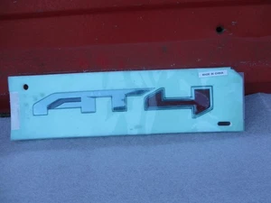 2019-2022  GMC SIERRA  AT4 Door Emblem   Genuine oem AT 4 - Picture 1 of 5