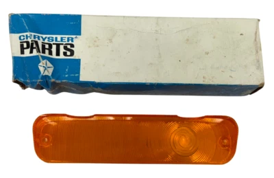 1963-1964 Dodge Chrysler New Port Right Parking Light Amber Lens 2448270 NOS - Image 1 of 4