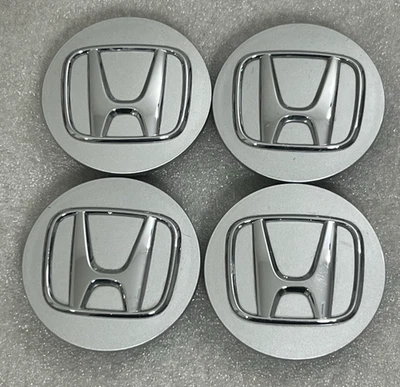 Tapas centrales OEM Honda 2,75" plateadas con emblema cromado P/N 44742 Foto 1 de 4