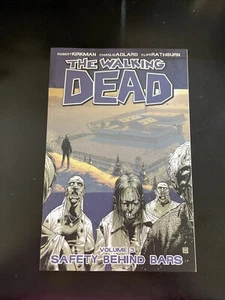 Safety Behind Bars de Robert Kirkman (2005, libro de bolsillo comercial) NUEVO - Imagen 1 de 2