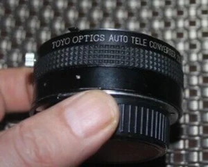 TOYO OPTICS 2x TELE CONVERTER AUTO NE (vetro Nikon e Nikonos) ottime condizioni! - Foto 1 di 4