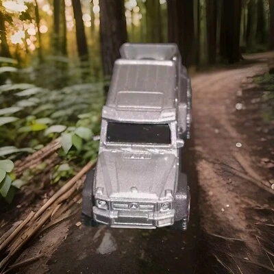 Caja de cerillas Mercedes-Benz G63 AMG 6X6 negra escala 1/64 suelta usada en excelente estado Foto 1 de 4