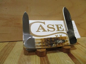New Case XX Smooth Amber Bone Canoe 62131 Pocket Knife (2023)-Carbon Steel Blade - Picture 1 of 9