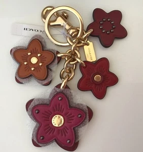 NWT COACH Wildflower Mix Leather Bag Charm in Oxblood Deep Berry Multi 5136 - Picture 1 of 3