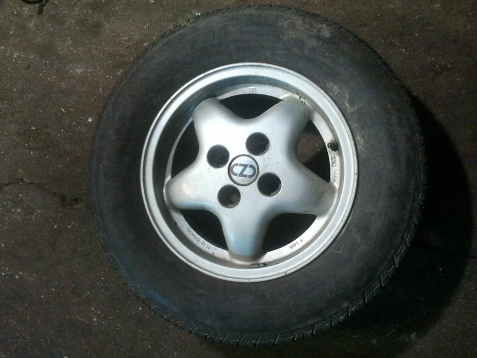 Alufelge OZ 4 Loch 13 Zoll 5,5Jx13 Toyota Celica V T18 Ersatzrad Komplettrad  - Bild 1 von 1