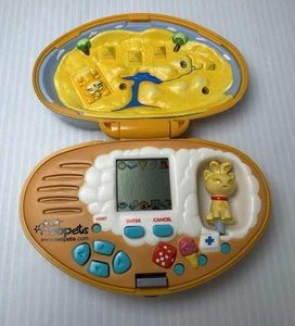 2002 Tiger Electronics NeoPets Pocket Pet Aisha gelb *nicht einschalten* - Bild 1 von 11
