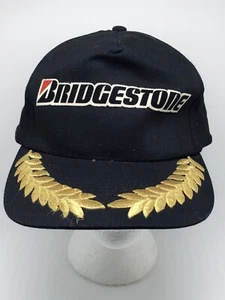Vintage Bridgestone Motorsports schwarz KC Marke Druckknopflasche Mütze mit goldenen Weizenohren - Bild 1 von 8