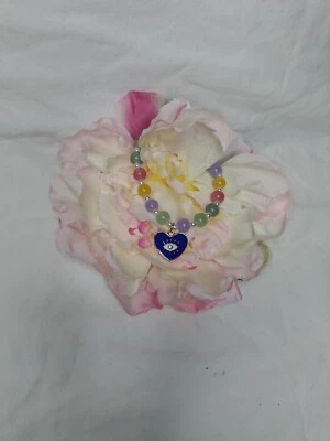 Brazalete elástico Evil Eye 🪬 tono dorado multicolor👌👌 Foto 1 de 2