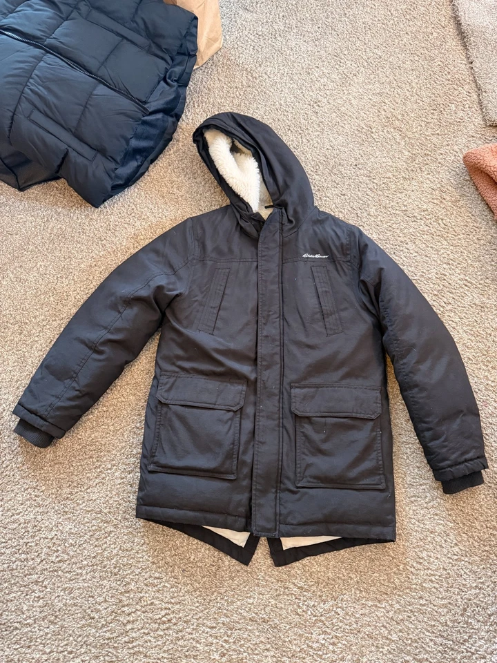 Parka de plumón superior Eddie Bauer para niños Abrigo Chaqueta Negro Bolsillos 10/12 Foto 1 de 4