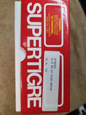 Motor de radiocontrol Super Tigre GS45 ABC de colección con silenciador y bujía incandescente nuevo stock antiguo  Foto 1 de 4