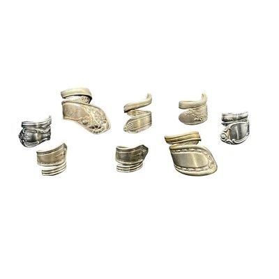 Lote de (8) anillos cuchara cubiertos vintage placa de plata tamaños de acero inoxidable varían a mano Foto 1 de 4