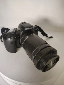Minolta Maxxum 400si fotocamera reflex pellicola nera con obiettivo zoom AF Tamron 100-300 mm - Foto 1 di 7