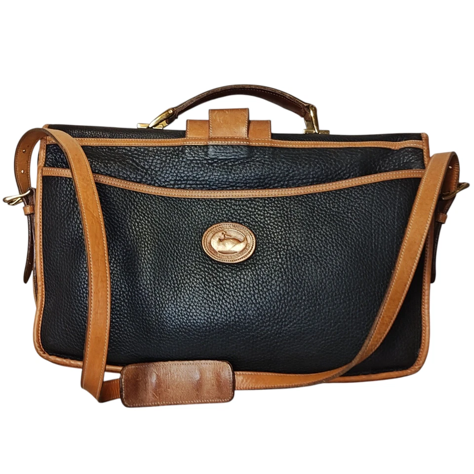 Maletín de cuero vintage Dooney & Bourke para todo tipo de clima negro tostado ribete mensajero Foto 1 de 4