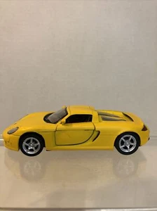 Kinsmart 1/36 Porsche Carrera GT Matte Yellow Pullback Action Die Cast - Picture 1 of 12