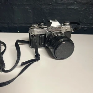 Fotocamera reflex Canon AT-1 vintage C con obiettivo FD 35-70 mm 3,5-4,5 - B121 - Foto 1 di 7