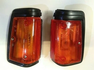 Front corner light turn signal lamp pair N/S Datsun 720 pickup truck 1982-1986 - Picture 1 of 11
