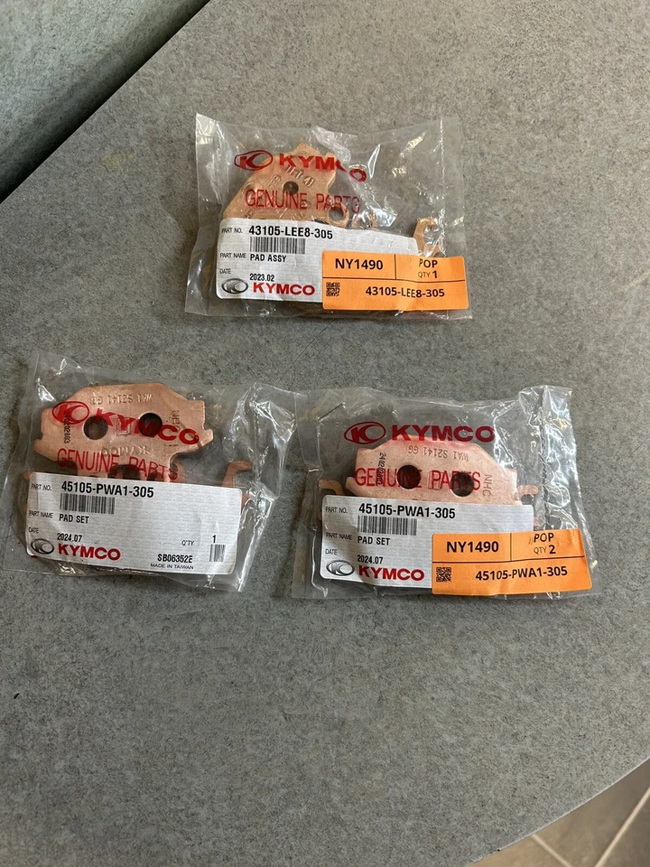 KYMCO UXV 450/500/700,  FRONT BRAKE PADS ( 2 SIDE AND REAR ) OEM KYMCO PART - Image 1 of 1