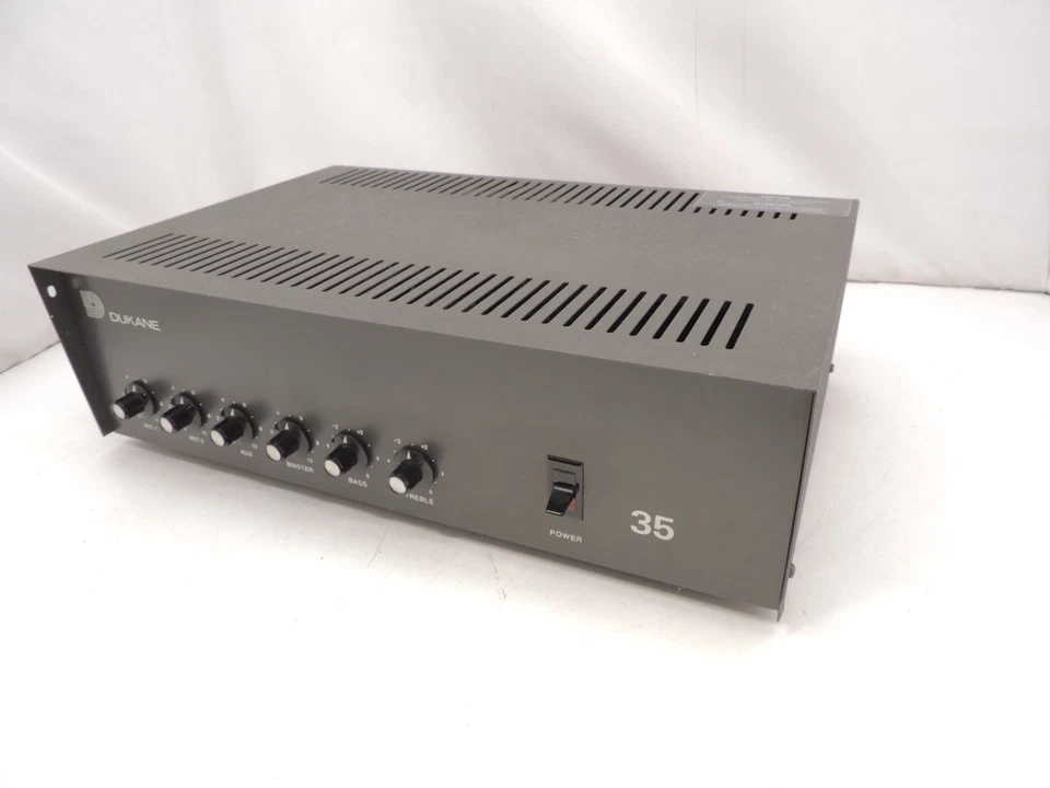 Vintage 80' Dukane 35 PA Amplifier 2 Mic Aux 4/8/16Ω 25V/70V Excellent 1A1335 - Image 1 of 4