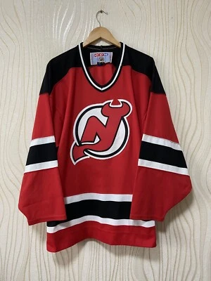 NUEVA CAMISETA DE LOS DEVILS HOCKEY SOBRE HIELO CAMISETA CAMPEÓN NHL ROJO talla XL PARA HOMBRES Foto 1 de 4