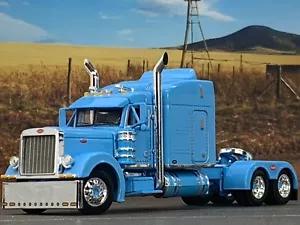 1/64 DCP BABY BLUE PETERBILT 379 W/ 63" MID ROOF SLEEPER W/ WHALE TAIL - Picture 1 of 5