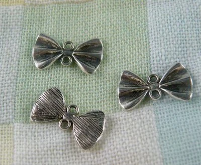 60pcs Tibetan Silver Bowknot Shaped Connectors 20.5x12x2mm 36582 - Image 1 of 2