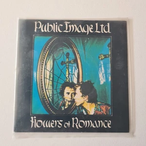 PUBLIC IMAGE LTD. FLOWERS OF ROMANCE / HOME IS WHERE THE HEART IS     7" VINYL - Bild 1 von 2