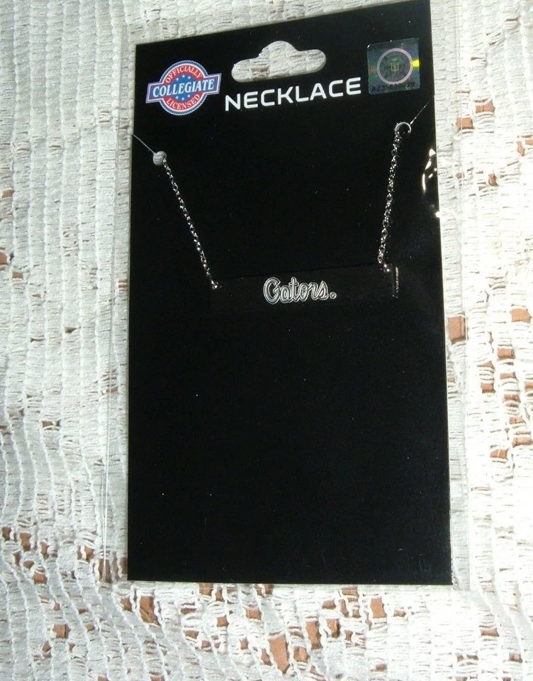 COLLAR BARRA PLATA FLORIDA GATORS 1 1/2" LARGO X 1/4" JOYERÍA DÍA JUEGO NUEVO  Foto 1 de 1