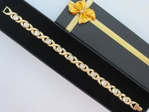 LADIES MAGNETIC BRACELET/BANGLE. CLEAR CRYSTAL ARTHRITIS/PAIN RELIEF GOLD TONE - Picture 1 of 2