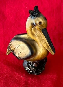 Vintage Small Resin Brown Pelican Figure Sitting on a Log 4.25" Tall - Picture 1 of 6