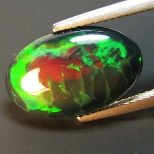 3.88Ct Natural Color Play Ethiopian Black Opal Oval Shape Cabochon Loose Gem VOD - Picture 1 of 6