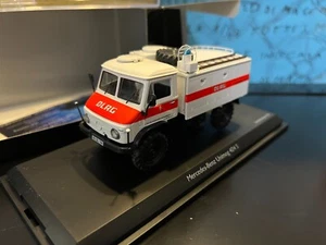 1/43 Schuco Mercedes Unimog 404 S TLF8 DLRG 450339600 ambulance marine rescue - Foto 1 di 2