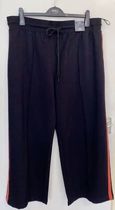 Pantaloni da jogging M&S a righe laterali gamba larga pista con coulisse UK 20 regular neri - Foto 1 di 9