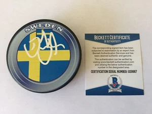 Daniel Sedin Signed Autographed Sweden Hockey Puck Beckett BAS COA Go Canucks a - Picture 1 of 3