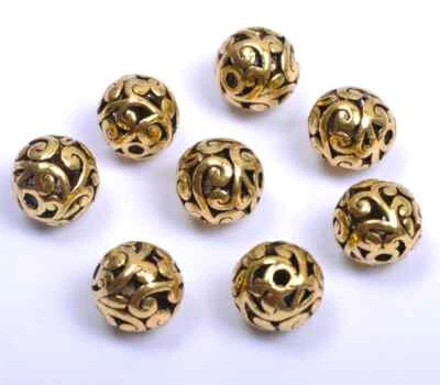 10 piezas cuentas espaciadoras huecas talladas en metal corazón redondo plata tibetana 12 mm Foto 1 de 2