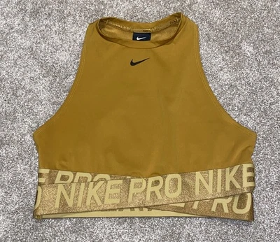 Camiseta sin mangas Nike Pro para mujer Intertwist cruzada BQ8316 talla L oro amarillo Foto 1 de 4