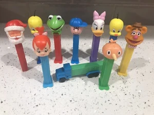 Pez Spender 10 Stück - Santa ohne Füße Kürbis Fozzie Tweety Kermit Gänseblümchen... - Bild 1 von 5
