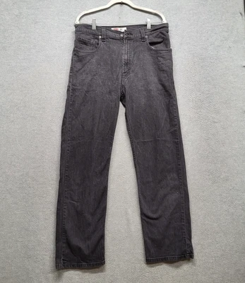 Pantalones de mezclilla negros 34X32 vintage Levi's 559 para hombre logotipo recto relajado 31" Y2K Foto 1 de 4