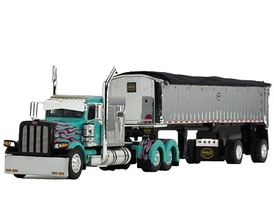 1/64 DCP PETERBILT 389 W/ MAC SPREAD AXLE DUMP TRAILER - Image 1 of 4