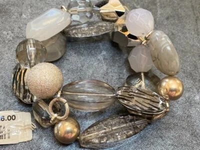 PULSERA DE PLÁSTICO CON CUENTAS DE PLATA ELÁSTICA DE 2 HILOS NUEVA CON ETIQUETAS - BISUTERÍA Foto 1 de 3