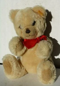 Steiff Teddybär Petsy Toldi Plüsch rotes Band gelbes Etikett genähte Nase bezaubernd - Bild 1 von 1